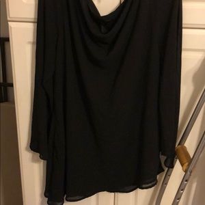 It’s a nice black dress shirt never worn